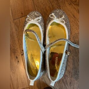 Crew cuts flats. Gold and sparkles. Fits a size 4.5-5 adult. Hardly used.